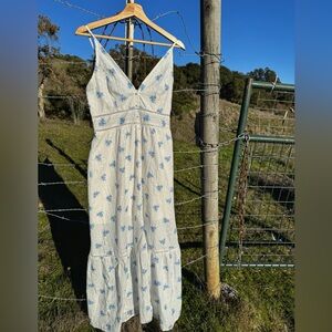 White eyelet country dress with blue flowers. Size large